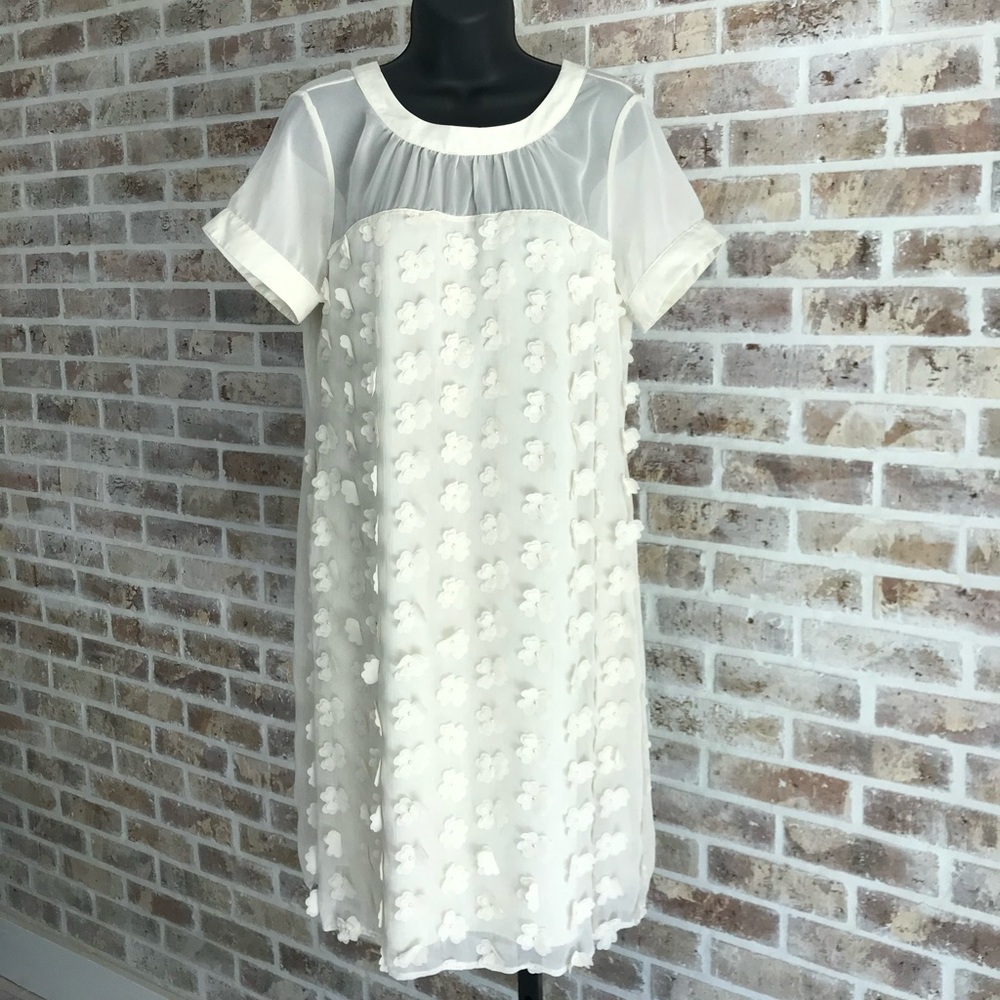 Women’s Medium cream dress with 3D flowers.
